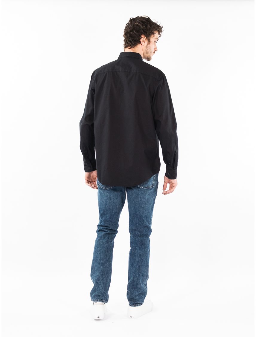 Camisa manga larga con bolsillo casual
