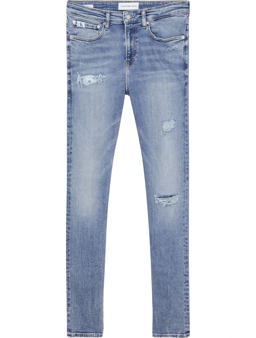 Jeans skinny con efecto desgastado y rotos