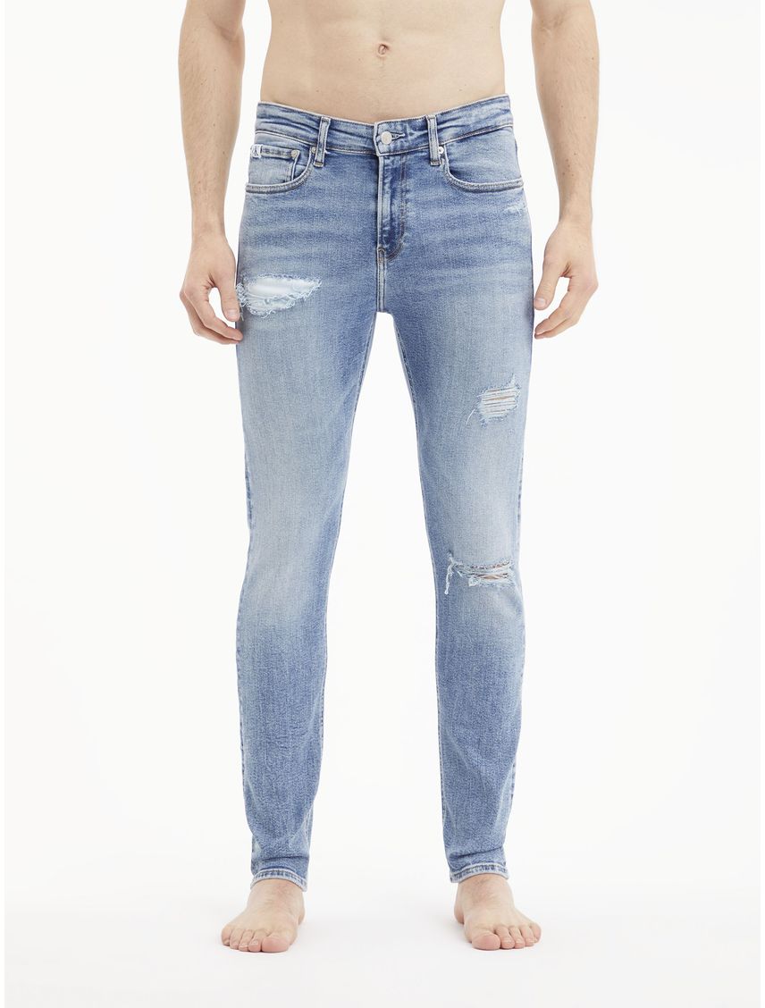 Jeans skinny con efecto desgastado y rotos