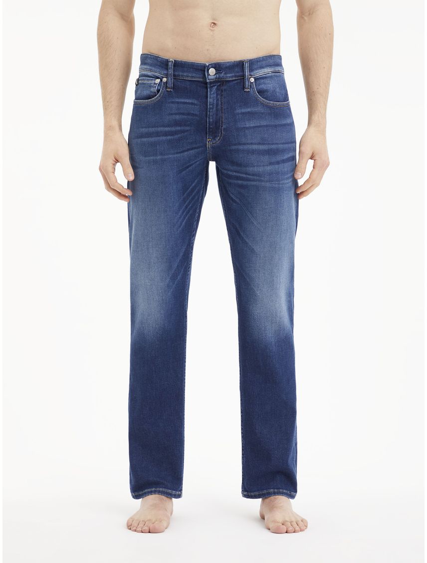 Jeans slim con efecto desgastado