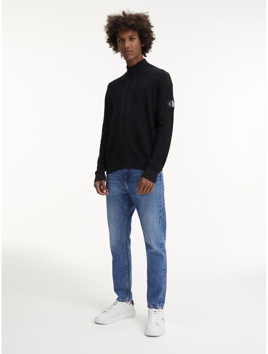 Sweater con cuello alto y cremallera