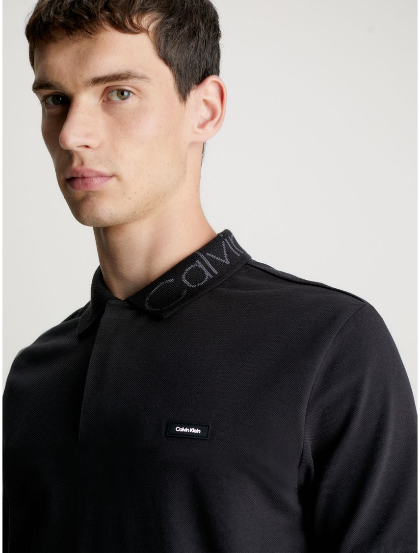 Chomba de piqué con cuello y logo