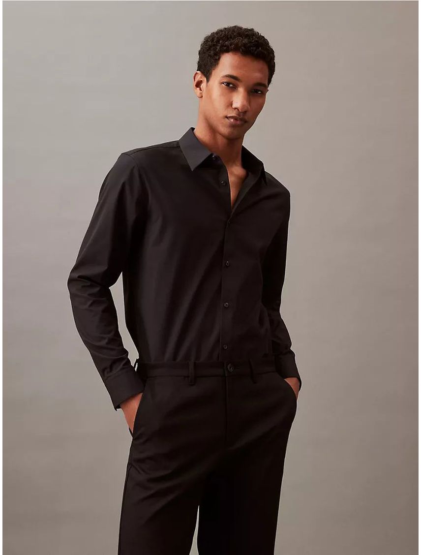 Camisa slim manga larga con tejido elástico