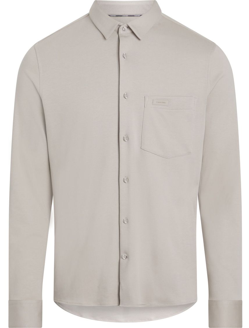Camisa slim manga larga con bolsillo