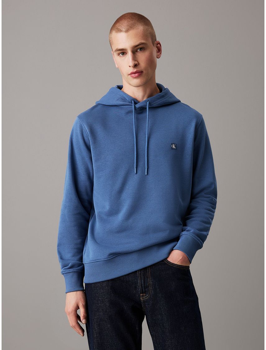 Buzo con capucha de felpa de algodón con insignia