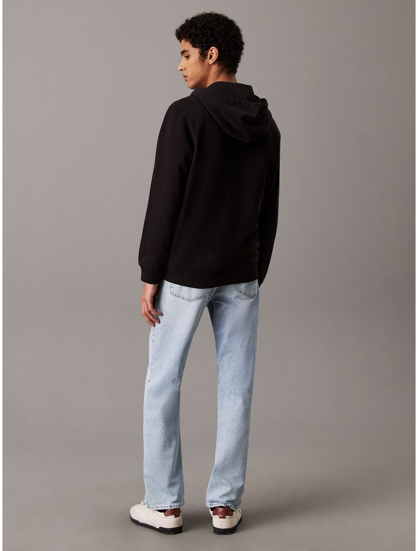 Buzo con capucha y etiqueta tejida