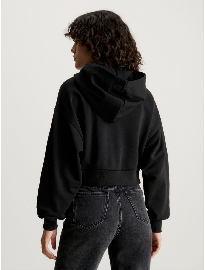 Buzo cropped con capucha y cremallera