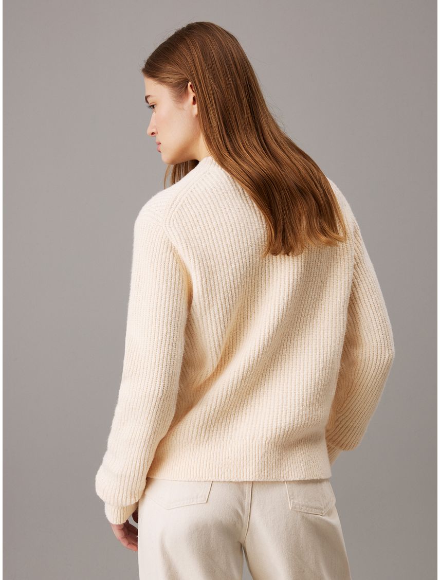 Sweater buclé de canalé