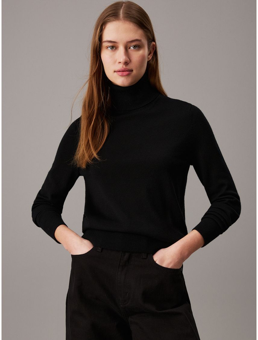 Sweater de cuello tortuga de lana merino