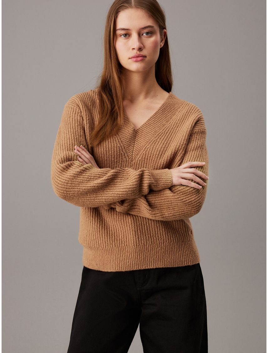 Sweater de pico de buclé de canalé