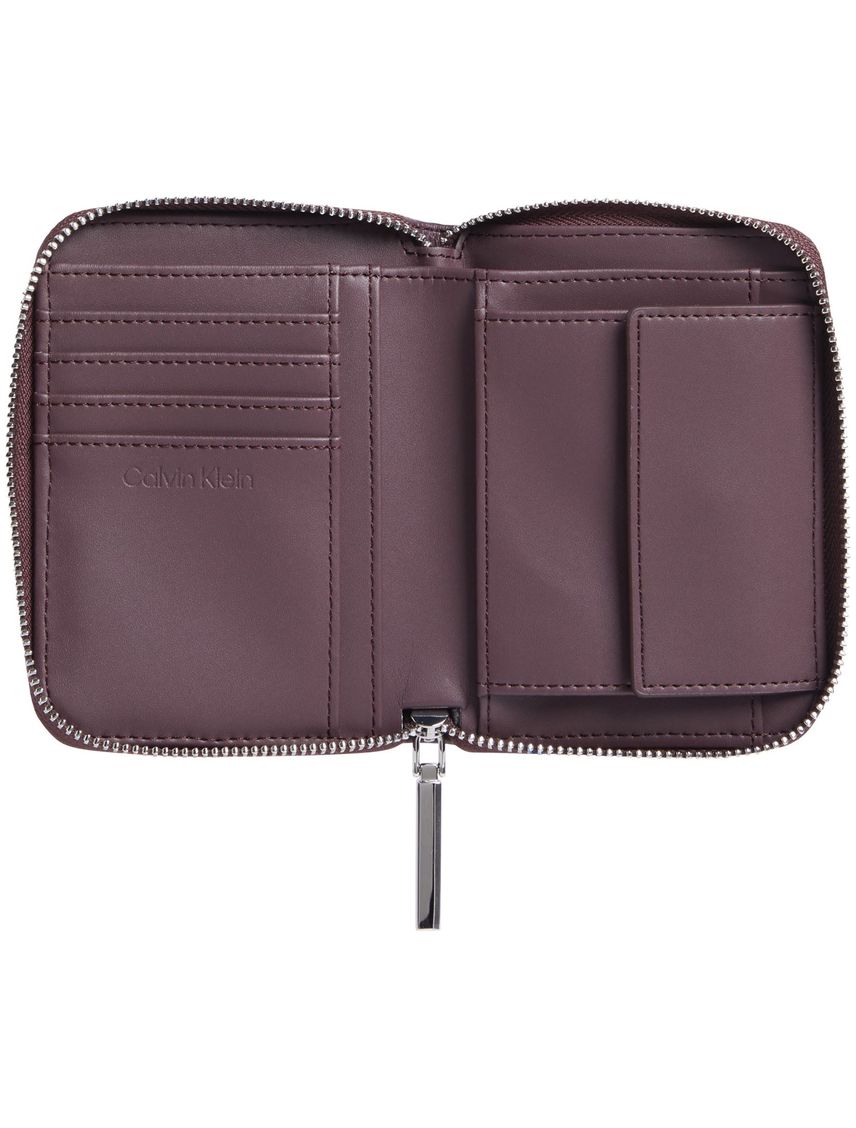 Billetera acolchada con cremallera en el contorno